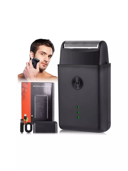Black and orange portable mini shaver by Trendsi with a sleek, compact design for convenient grooming on the go.