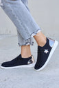 Black pewter Forever Link Star lace-up flat sneakers by Trendsi, featuring stylish design and comfortable flat sole.