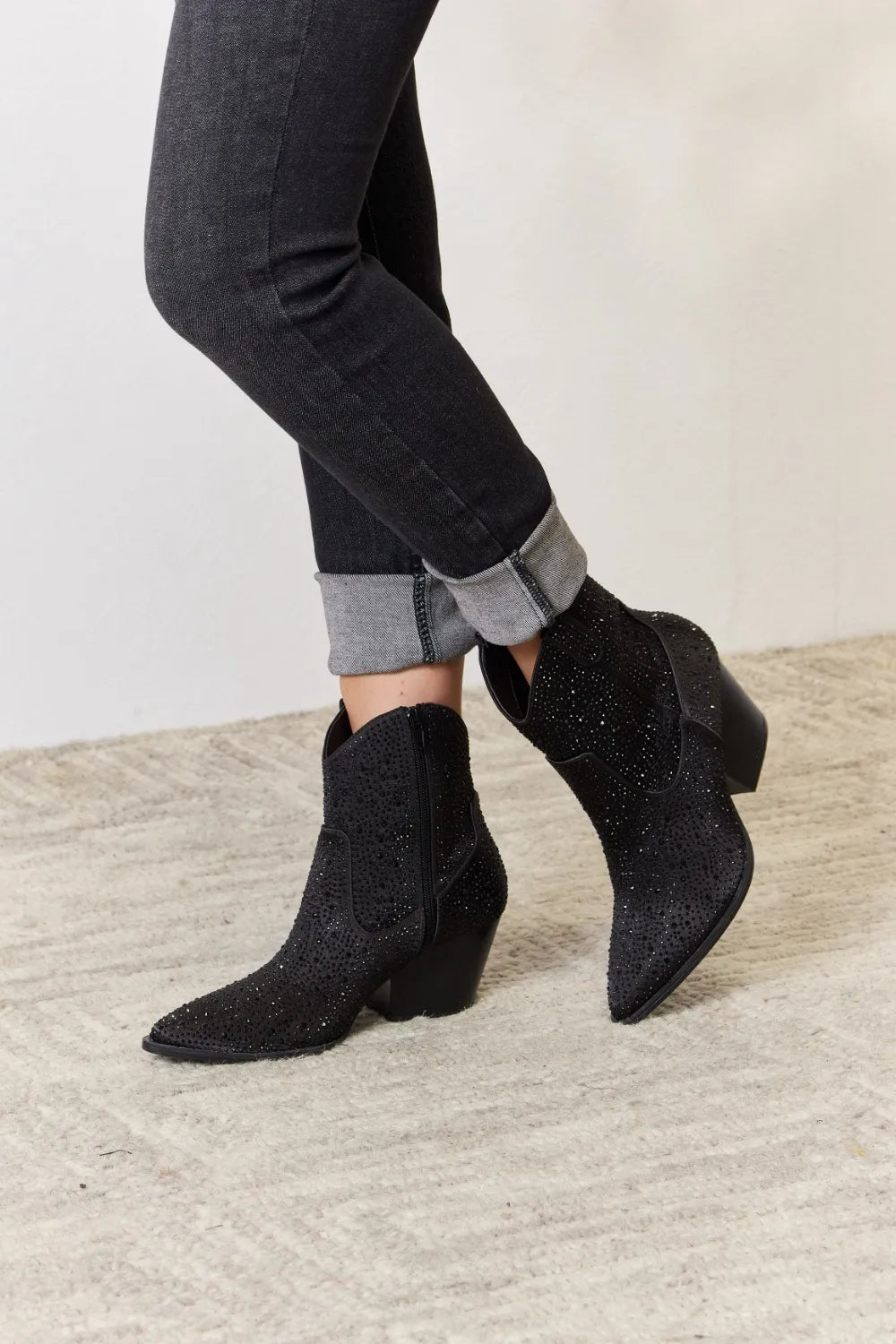 Black rhinestone ankle cowboy boots by East Lion Corp featuring decorative rhinestones and classic Western style.