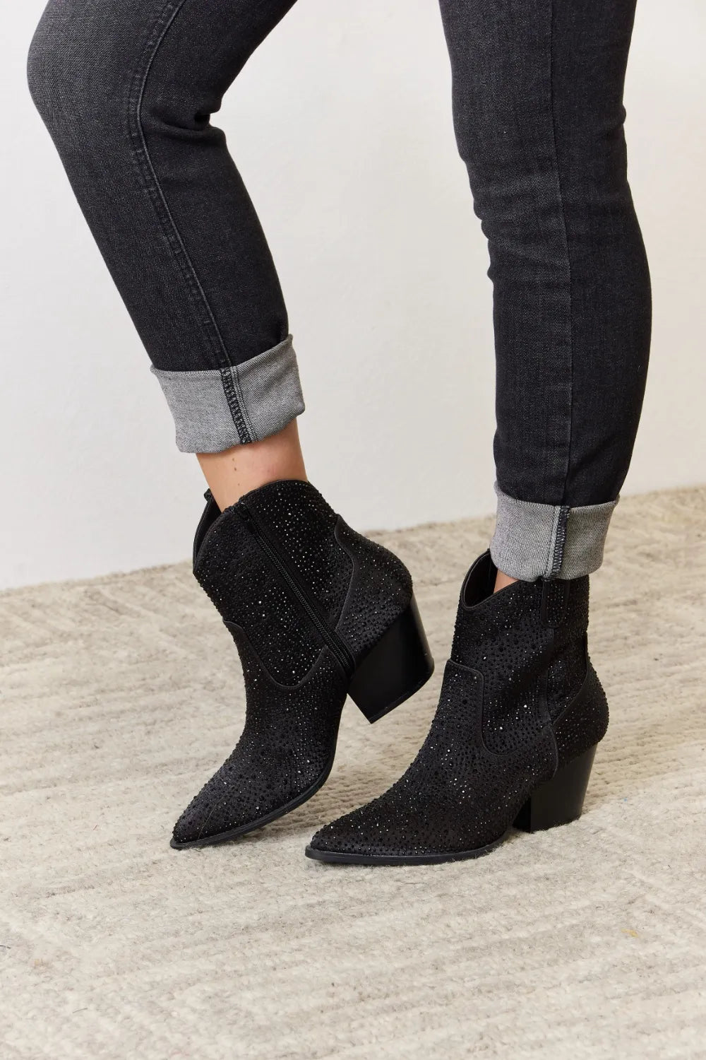 Black rhinestone ankle cowboy boots by East Lion Corp featuring sparkling rhinestones and classic Western-style design.