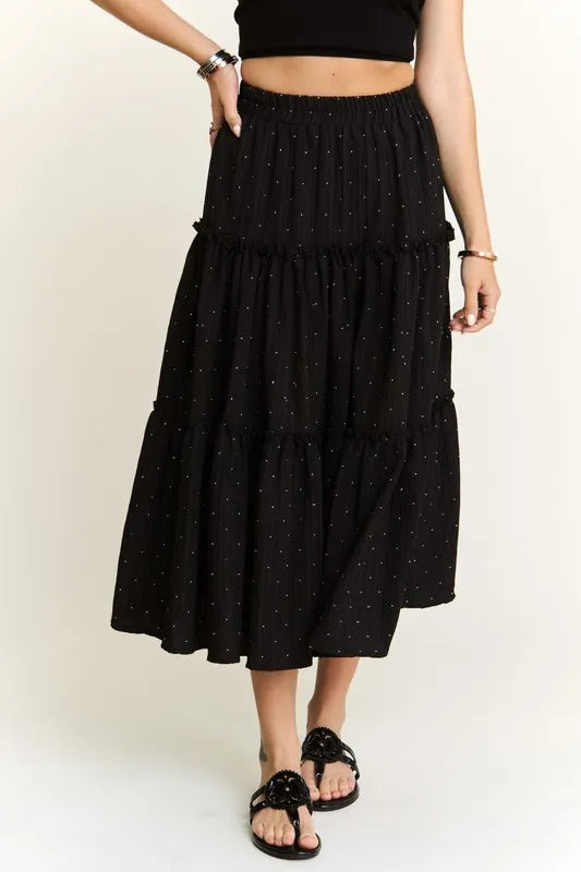 Black ADORA Rhinestone Accent Tiered Skirt by Trendsi featuring layered fabric and sparkling rhinestone details.