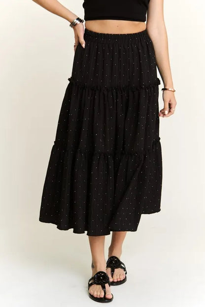 Black ADORA Rhinestone Accent Tiered Skirt by Trendsi featuring layered fabric and sparkling rhinestone details.