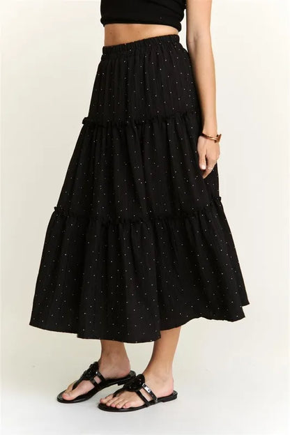 Black ADORA Rhinestone Accent Tiered Skirt by Trendsi, featuring multiple layered tiers and sparkling rhinestone detailing.