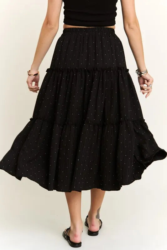 Black ADORA Rhinestone Accent Tiered Skirt by Trendsi, featuring shimmering rhinestones and layered fabric for a stylish look.