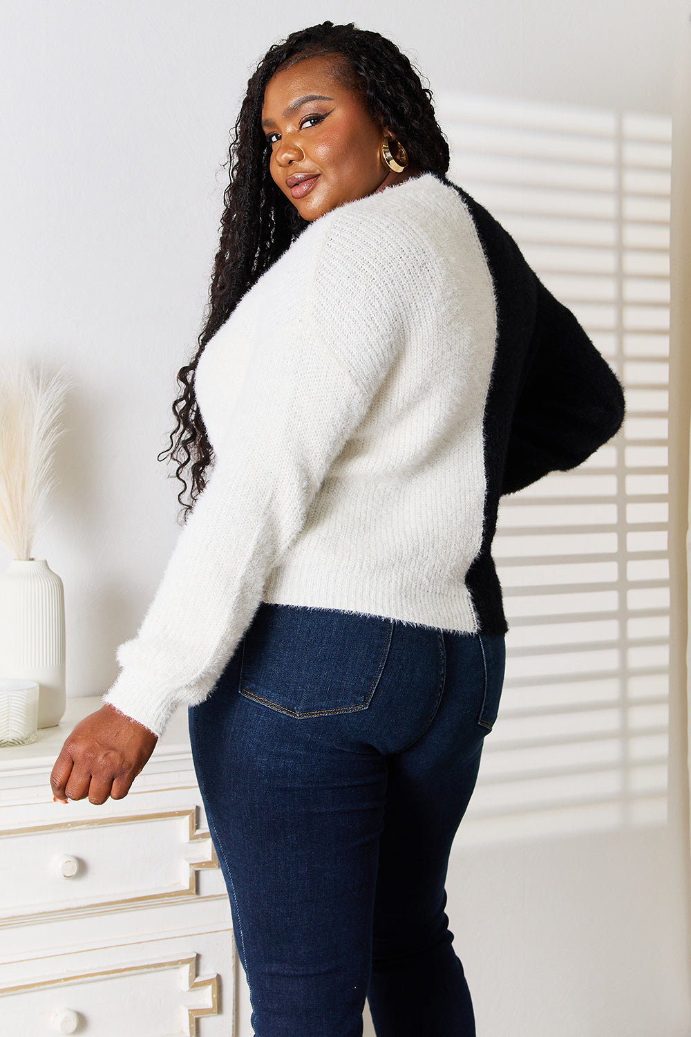 Black angel wings woven V-neck cardigan with contrast button-front and long sleeves, stylish and cozy for casual wear.