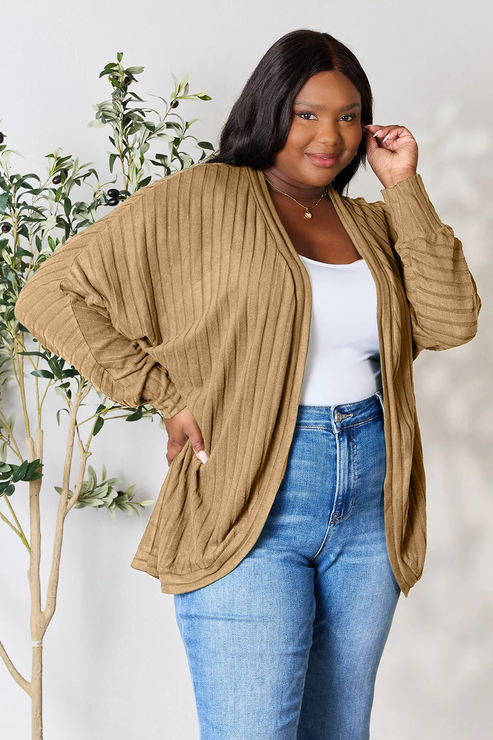 Black Basic Bae full-size ribbed cocoon cardigan by Trendsi, shown flat with long sleeves and textured knit fabric.