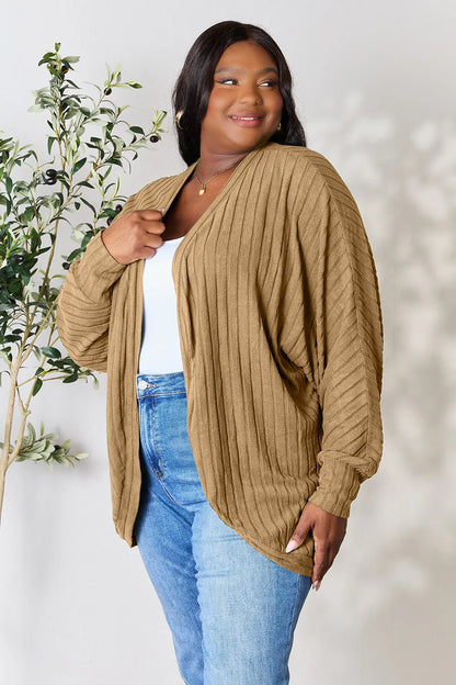 Black Trendsi Basic Bae full-size ribbed cocoon cardigan draped on a hanger with a cozy, relaxed fit.