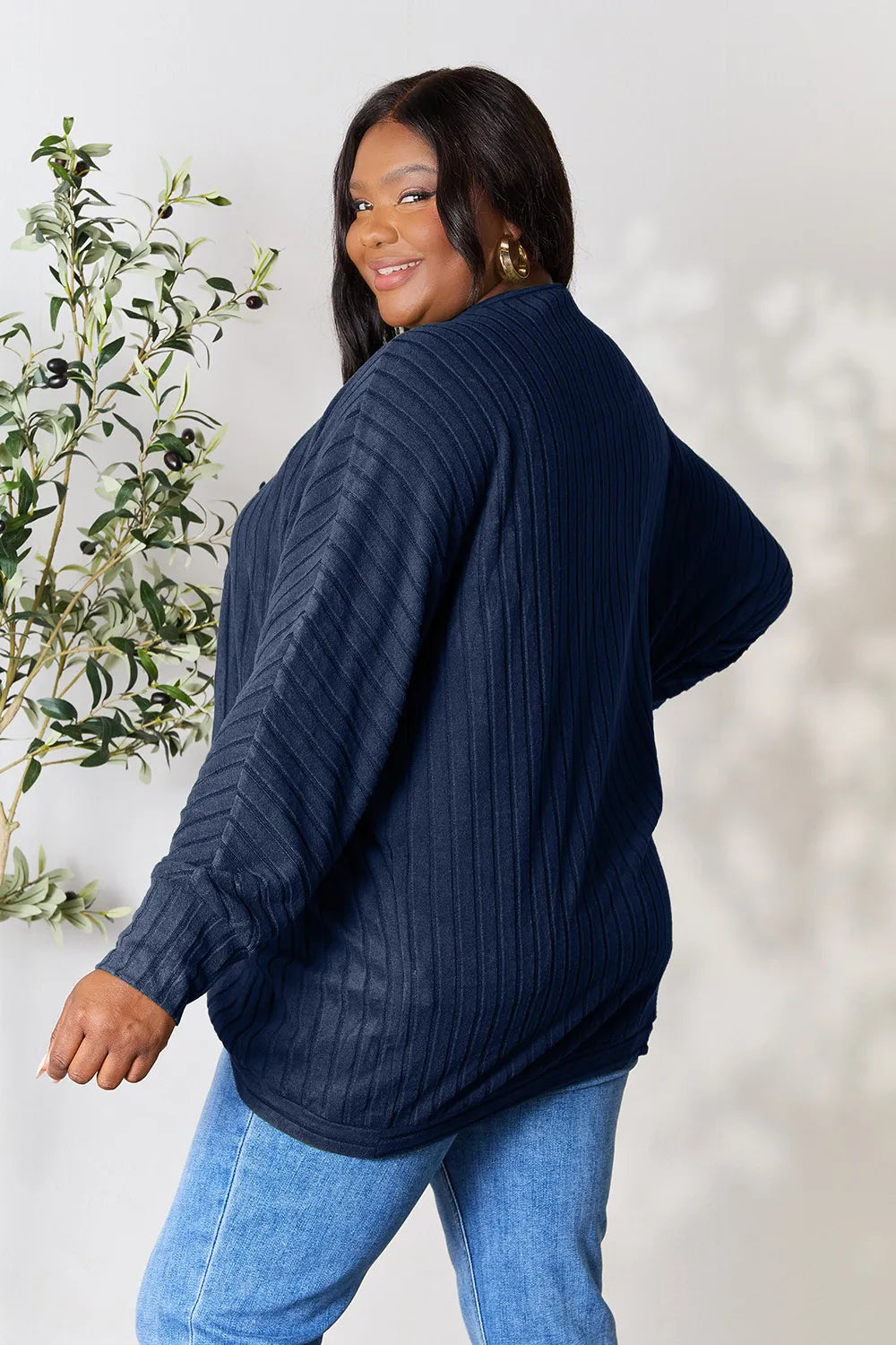 Black Basic Bae Full Size Ribbed Cocoon Cardigan by Trendsi, featuring a cozy, oversized ribbed knit design for casual wear.