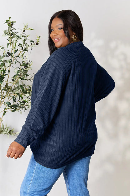 Black Basic Bae Full Size Ribbed Cocoon Cardigan by Trendsi, featuring a cozy, oversized ribbed knit design for casual wear.