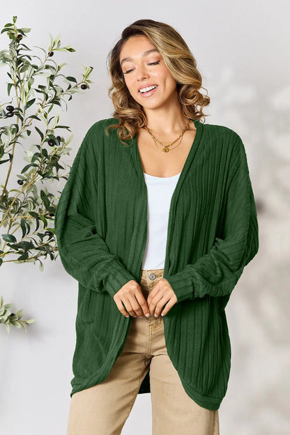 Black Basic Bae full-size ribbed cocoon cardigan from Trendsi, shown on a model, featuring a soft, cozy knit fabric and relaxed fit.