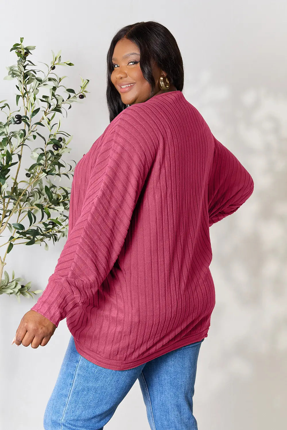 Black Basic Bae Full Size Ribbed Cocoon Cardigan by Trendsi, featuring a cozy, oversized fit with ribbed knit texture.