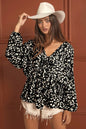 Black BiBi Leopard woven tied spaghetti strap V-neck sleeveless top by Trendsi, featuring a stylish leopard print and tie detail.