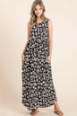 Black BOMBOM Leopard Maxi Dress with Pockets by Trendsi featuring bold leopard print and a flowing silhouette.