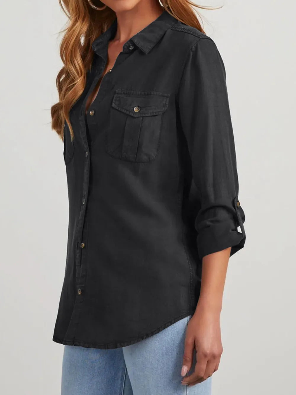 Black denim top with a collared neckline and roll-tab sleeves, featuring a trendy, casual style from Trendsi.