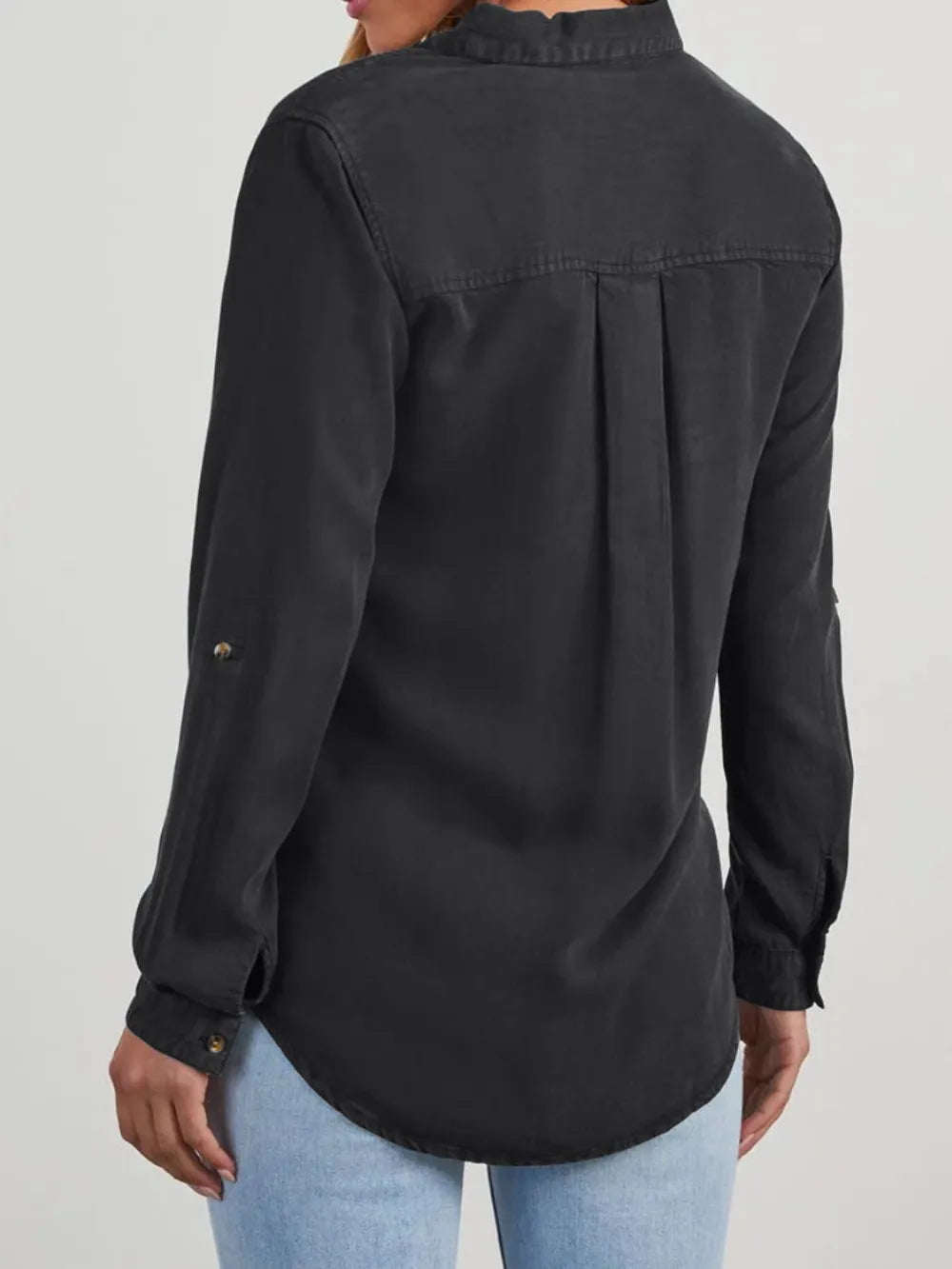 Black denim top with collared neckline and roll-tab sleeves, featuring a stylish, casual design from Trendsi.