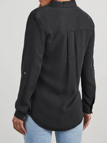 Black denim top with collared neckline and roll-tab sleeves, featuring a stylish, casual design from Trendsi.