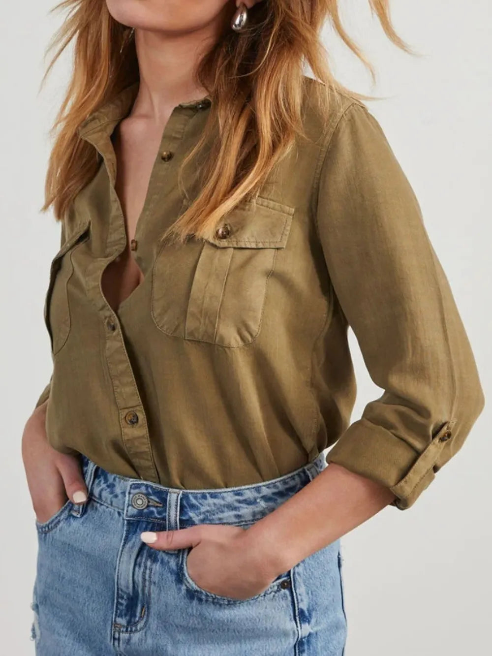 Black denim top with collared neckline and roll-tab sleeves, stylish Trendsi women's casual shirt.