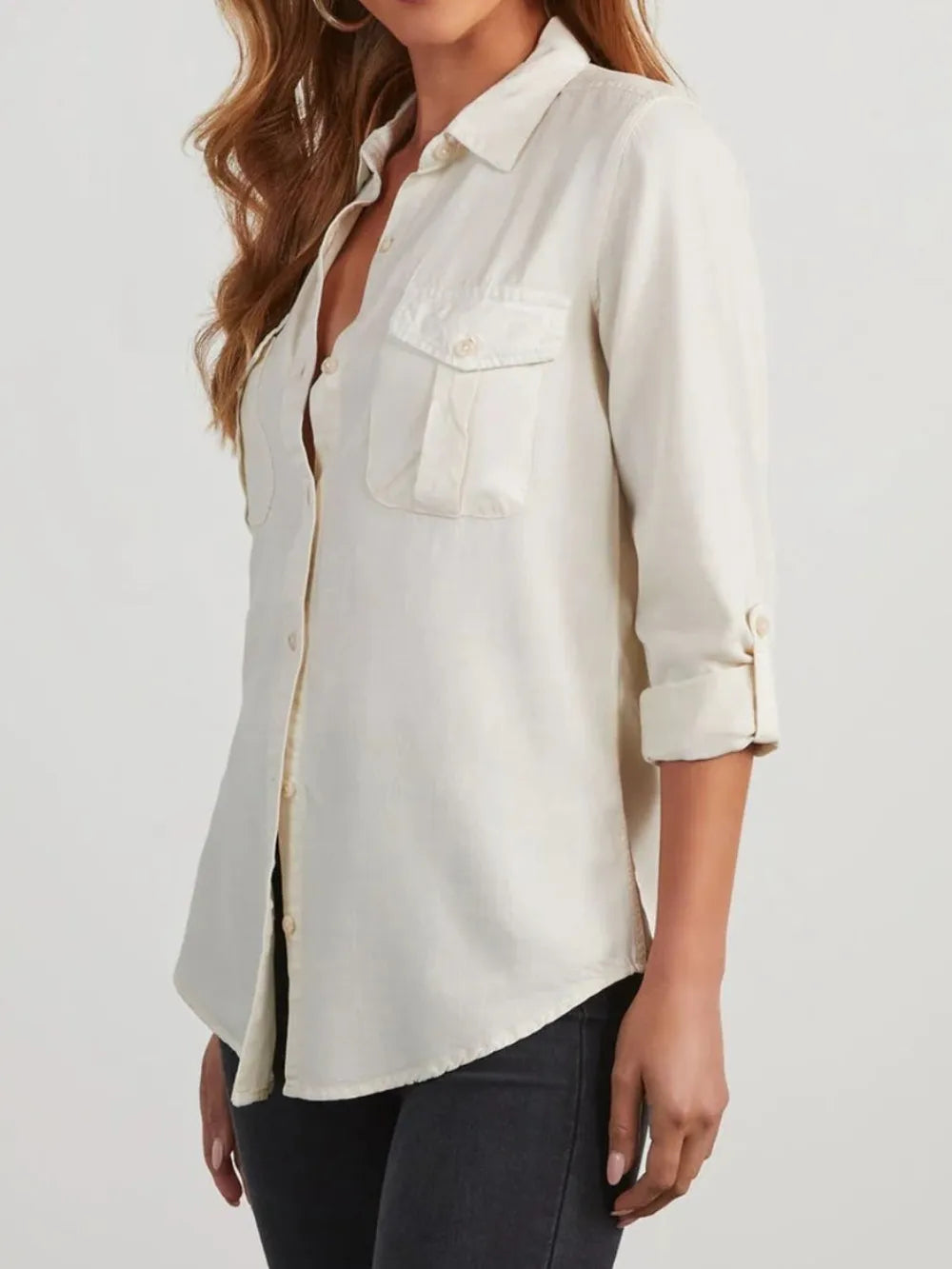 Black denim top with a collared neck and roll-tab sleeves, featuring a trendy, casual style perfect for everyday wear.