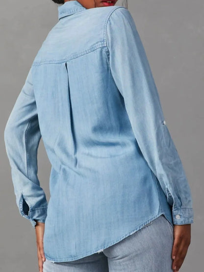 Black denim top with a collared neck and roll-tab sleeves, featuring a stylish and casual design from Trendsi.