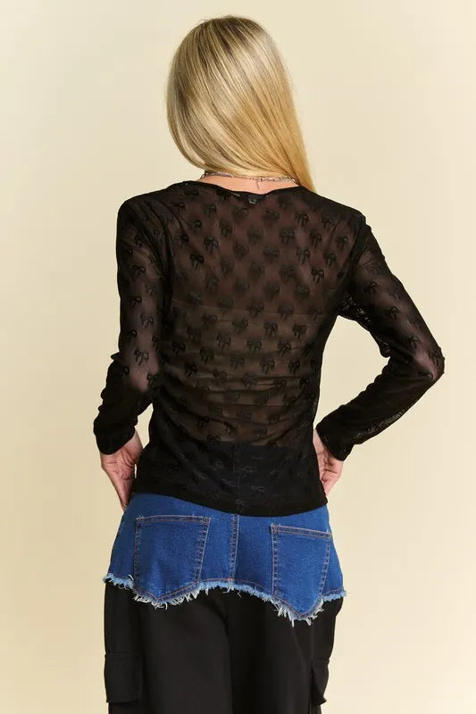 Black Davi & Dani bow mesh long sleeve top with round neckline, stylish and lightweight for a trendy look.