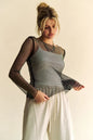 Black Davi & Dani sparkling rhinestone sheer mesh round neck top by Trendsi, featuring intricate rhinestone embellishments and sheer fabric.