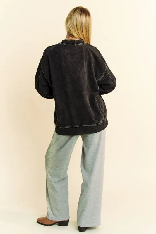 Black Davi & Dani acid-washed sweatshirt with star patch and stud embellishments, casual and stylish for everyday wear.