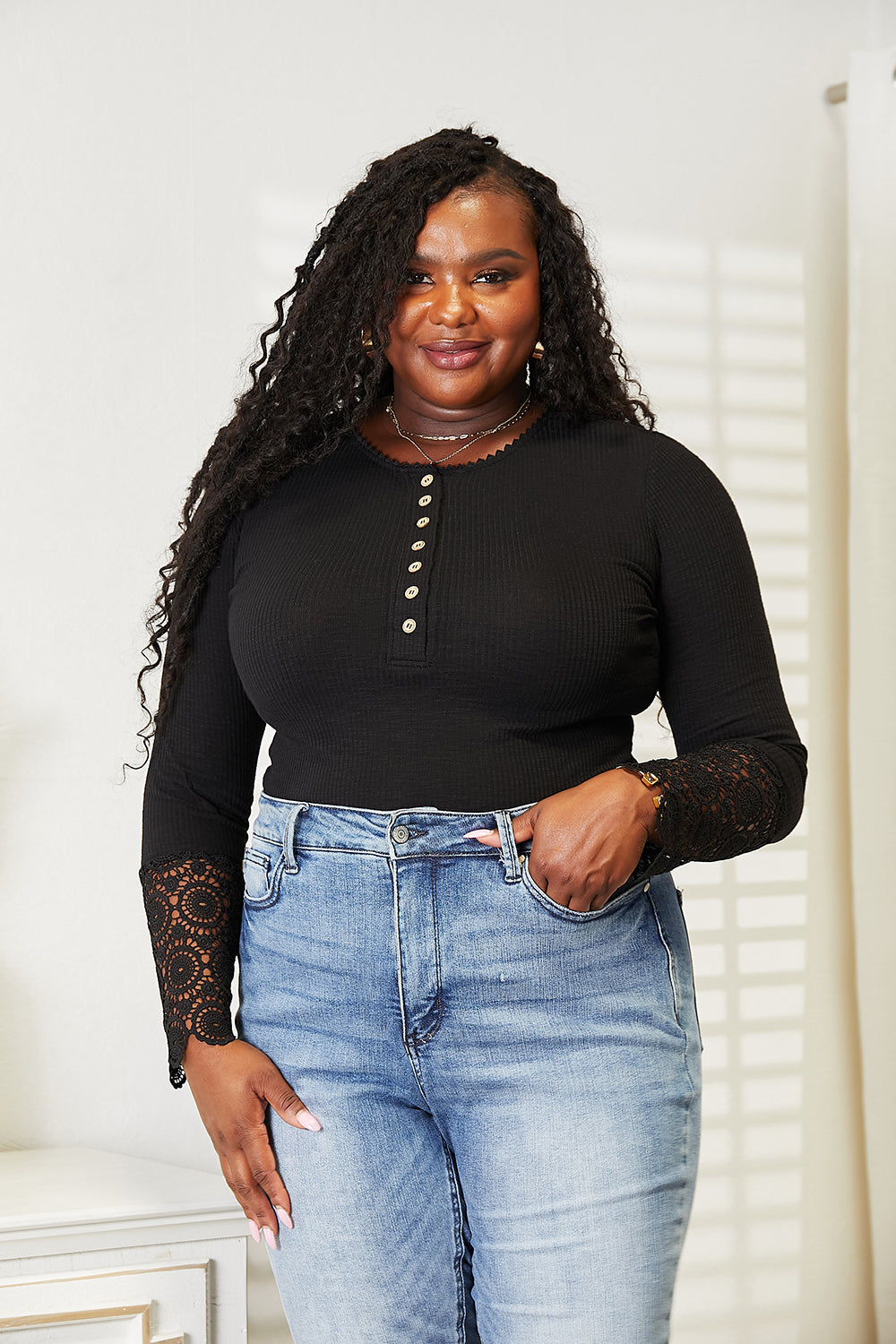 Black Trendsi Double Take crochet lace hem sleeve button top featuring a relaxed fit and stylish design.