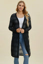Black Trendsi Double Take full-size open front longline cardigan displayed hanging with a relaxed fit and open front design.