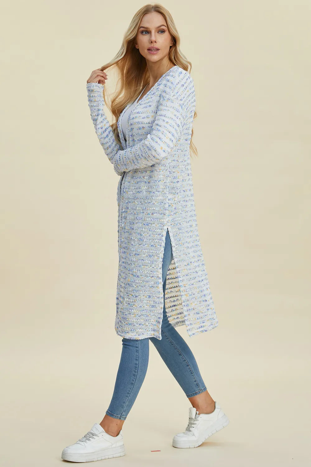 Black Trendsi Double Take full-size open front longline cardigan displayed on a model, showcasing its relaxed fit and open-front design.