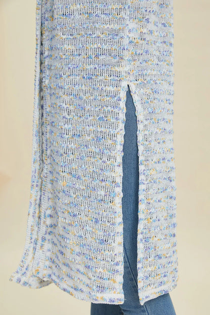 Black Trendsi Double Take full-size open front longline cardigan displayed on a model, showcasing its relaxed fit and open front design.