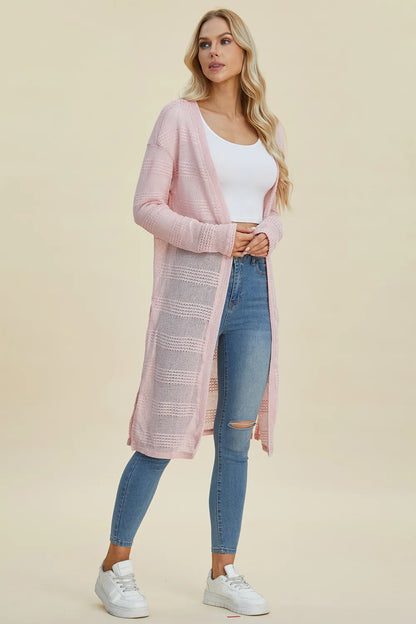 Black Trendsi Double Take full size open front longline cardigan hanging on a rack, showcasing its relaxed, draped style.