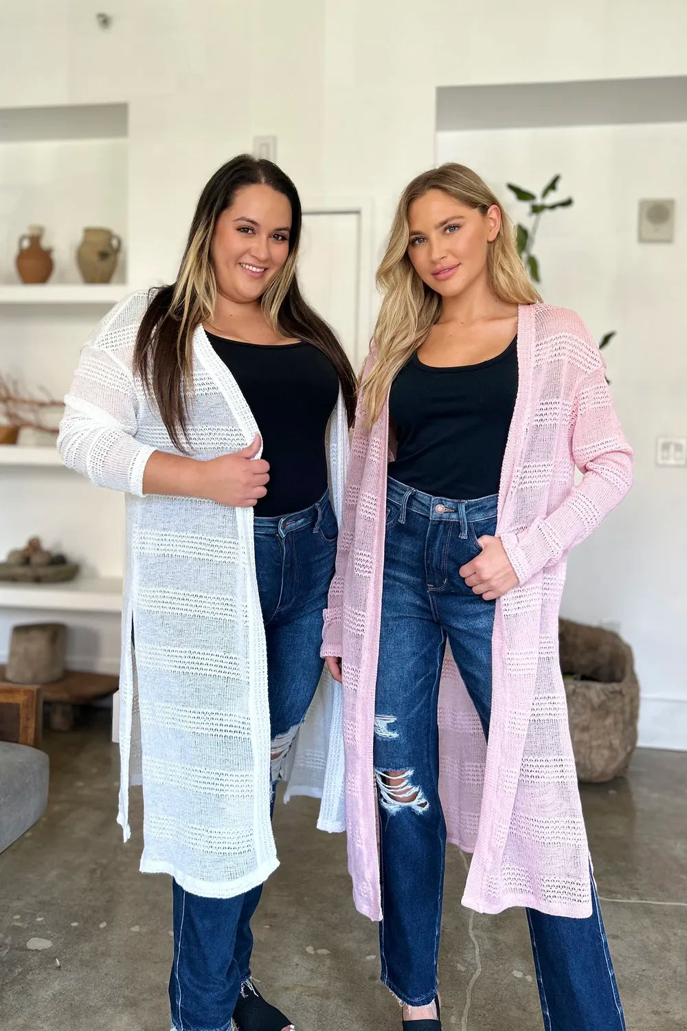 Black double take full-size open front longline cardigan by Trendsi, showing its relaxed fit and lightweight knit fabric.