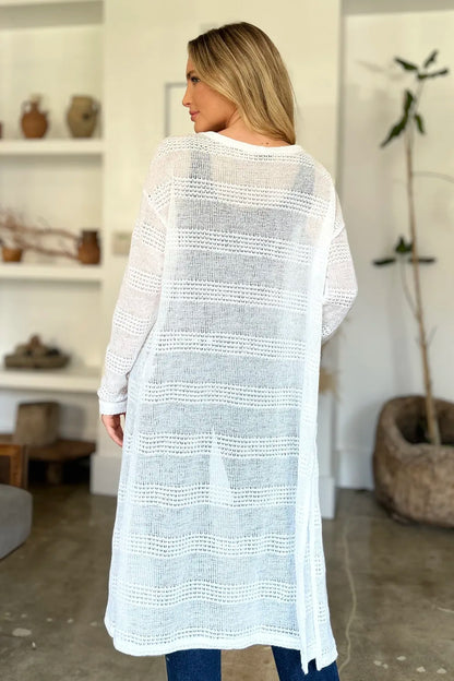 Black Trendsi Double Take full-size open front longline cardigan displayed on a model, showcasing its relaxed fit and draped style.