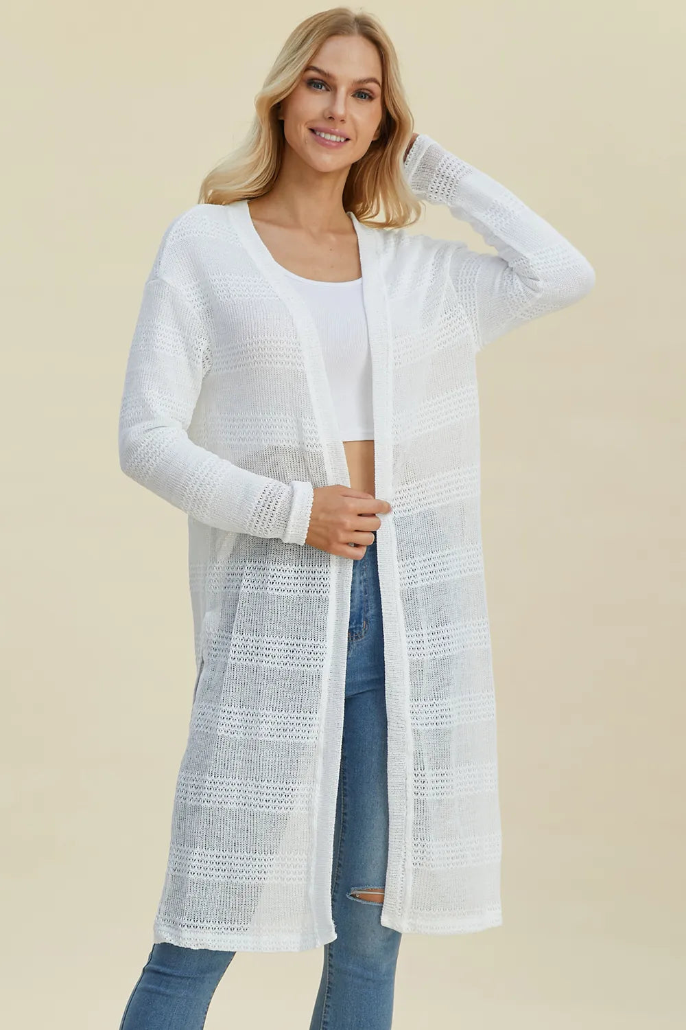 Black Trendsi Double Take full-size open front longline cardigan displayed on a model, showcasing its relaxed fit and draped design.