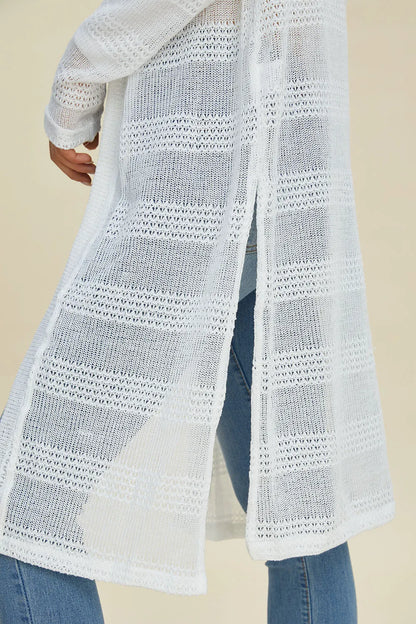 Black open-front longline cardigan by Trendsi, double take full size, featuring a cozy, stylish design with a relaxed fit.