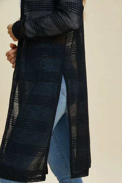 Black Trendsi Double Take full-size open front longline cardigan displayed on a model, showcasing its relaxed fit and longline design.