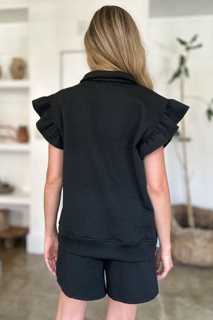 Black double take texture flounce sleeve top and shorts set by Trendsi, featuring stylish, coordinated summer casual wear.