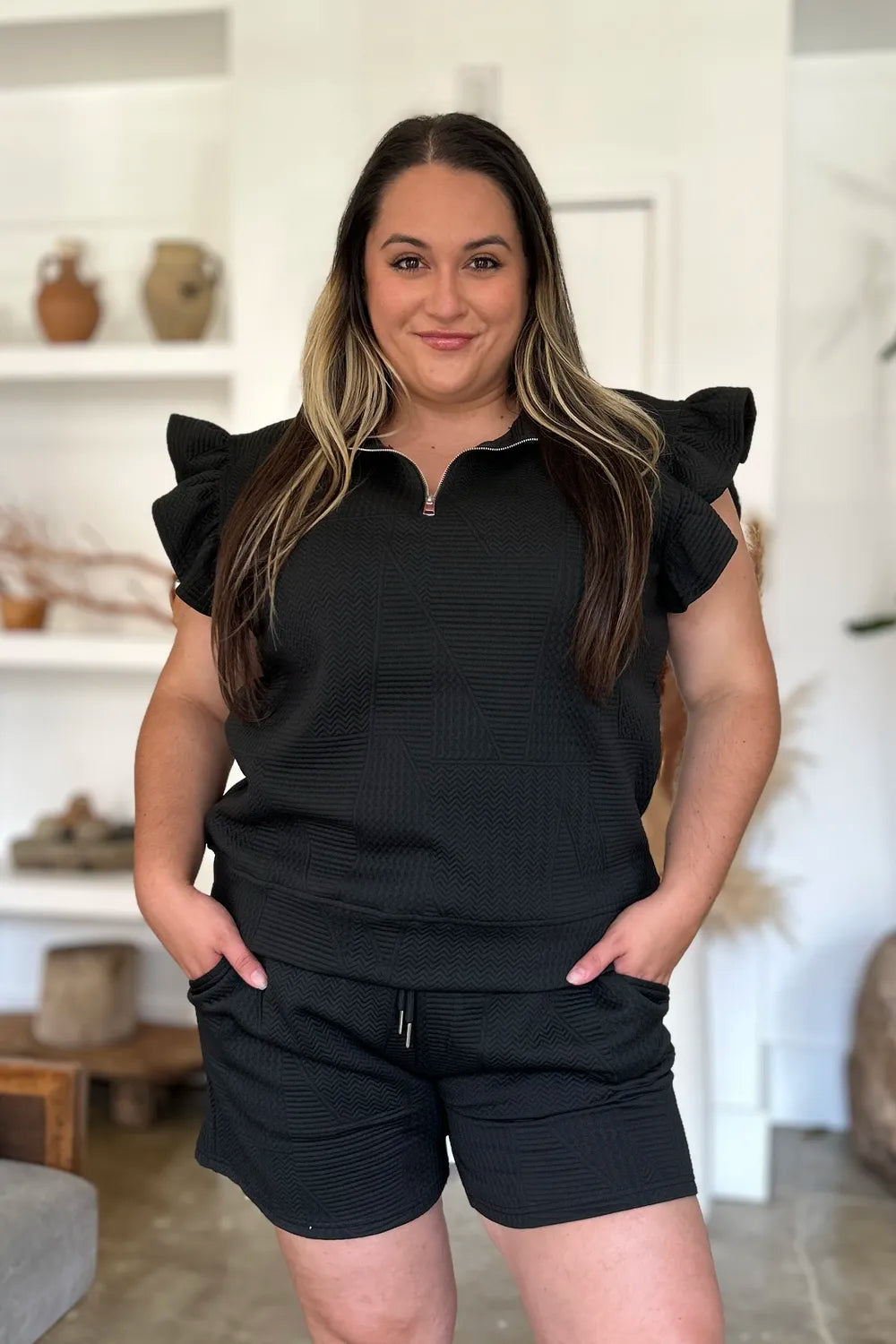 Black double take texture top and shorts set from Trendsi with flounce sleeves, full-size, stylish and comfortable summer outfit.