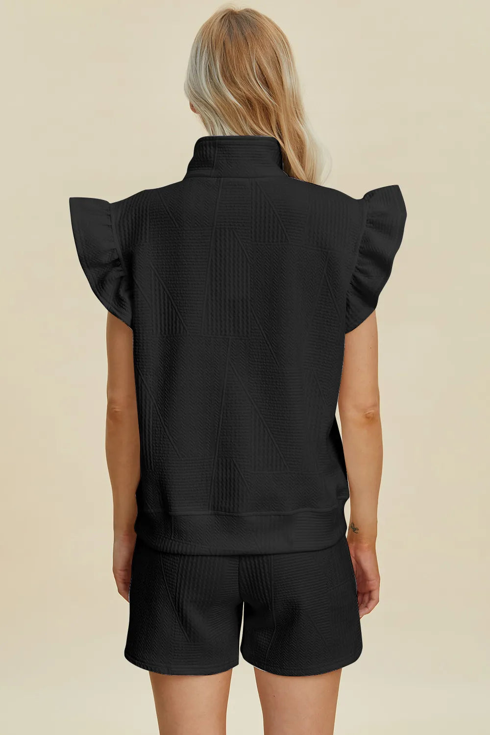 Black Trendsi Double Take texture flounce sleeve top and shorts set, featuring stylish flounce sleeves and comfortable fit.