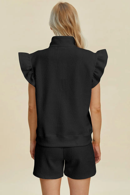 Black Trendsi Double Take texture flounce sleeve top and shorts set, featuring stylish flounce sleeves and comfortable fit.