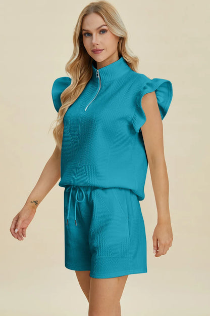 Black Trendsi double take texture flounce sleeve top and matching shorts set, stylish and comfortable for casual wear.