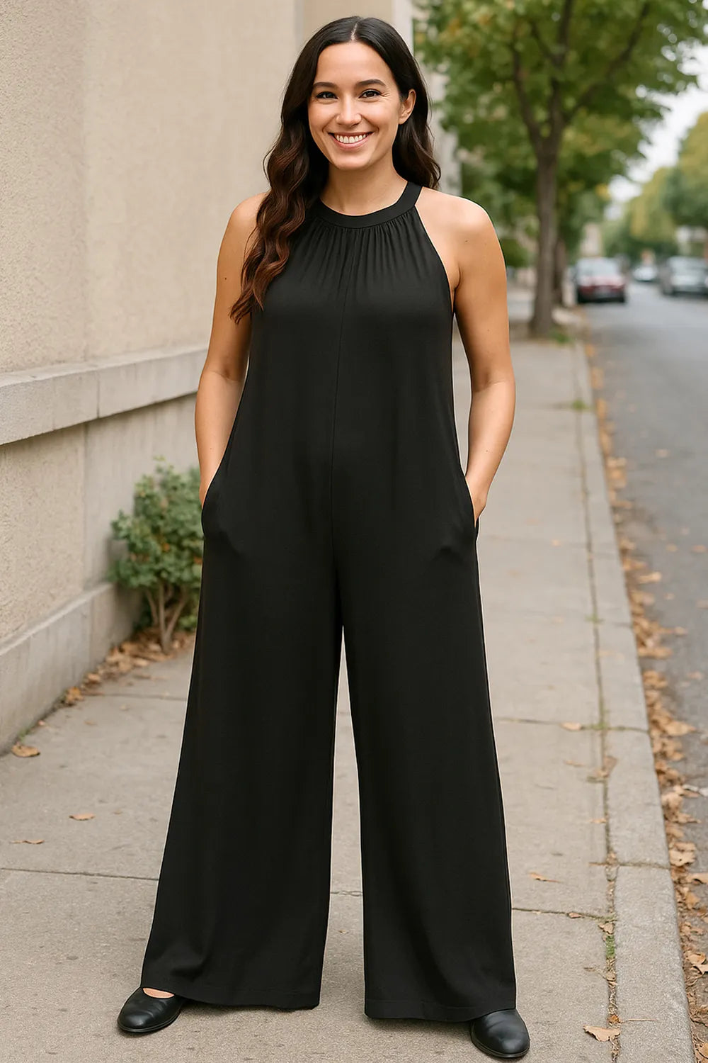 Black Trendsi Double Take sleeveless jumpsuit with tie-back and cutout details, full size, stylish and modern for casual or dressy wear.