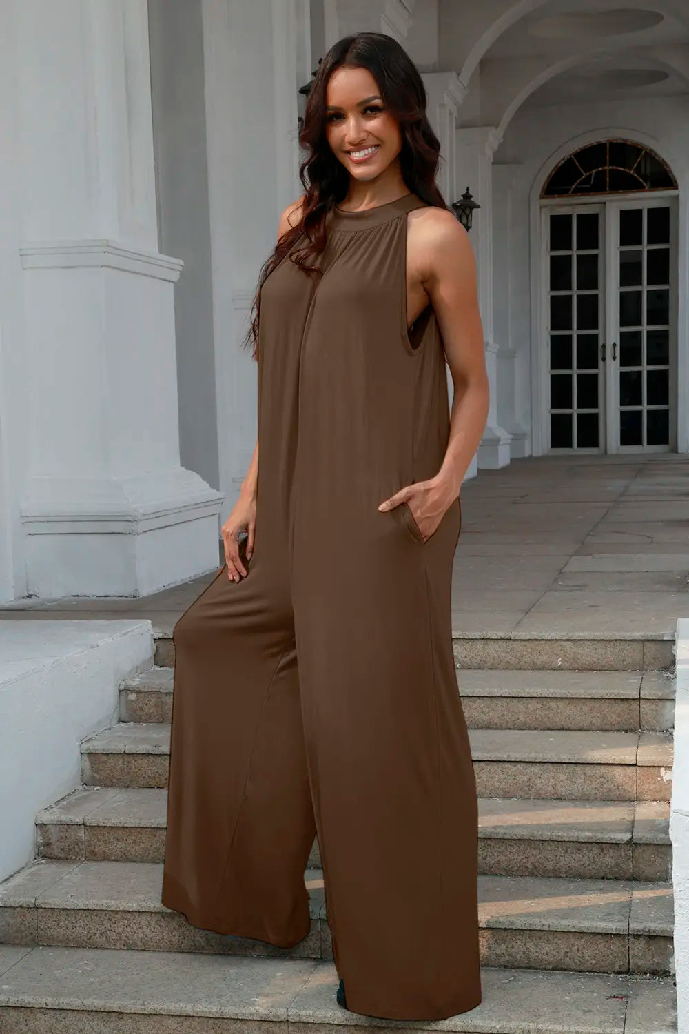Black Trendsi Double Take sleeveless jumpsuit with tie-back and cutout details, full size, stylish and modern for all-day wear.