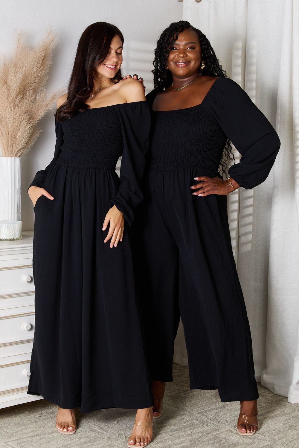 Black Trendsi Double Take square neck jumpsuit with pockets, stylish and comfortable, shown on a model.