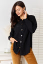 Black waffle-knit collared neck dropped shoulder shirt from Trendsi, featuring a relaxed fit and casual style.