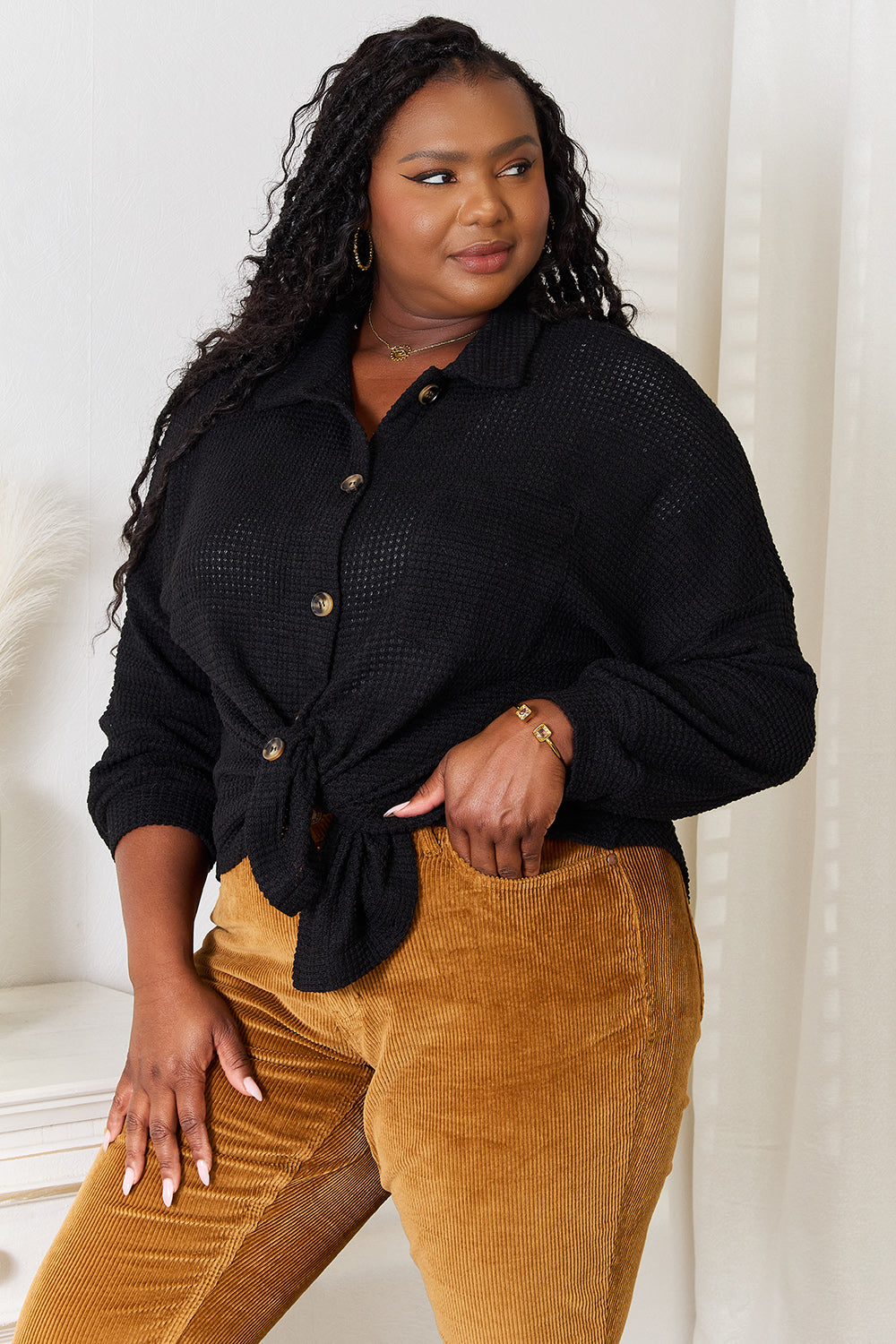 Black waffle-knit collared neck dropped shoulder shirt by Trendsi, featuring a relaxed fit and casual style.