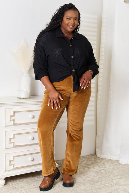 Black waffle-knit collared shirt with dropped shoulders and long sleeves, casual trendy style by Trendsi.
