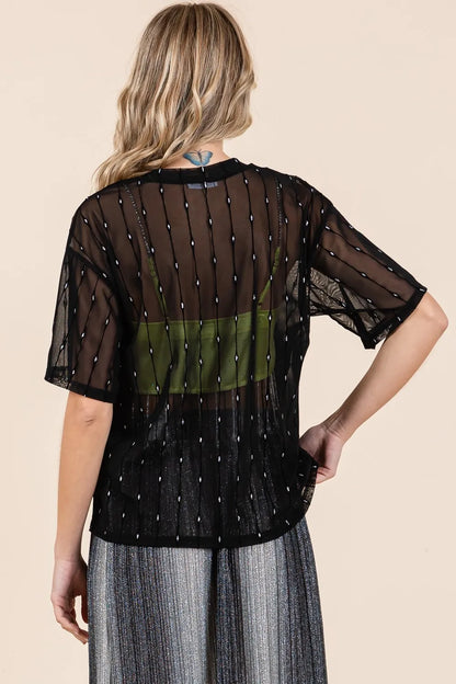 Black GeeGee mesh glitter top with round neck and drop shoulder design by Trendsi, featuring a stylish and shimmering fabric.