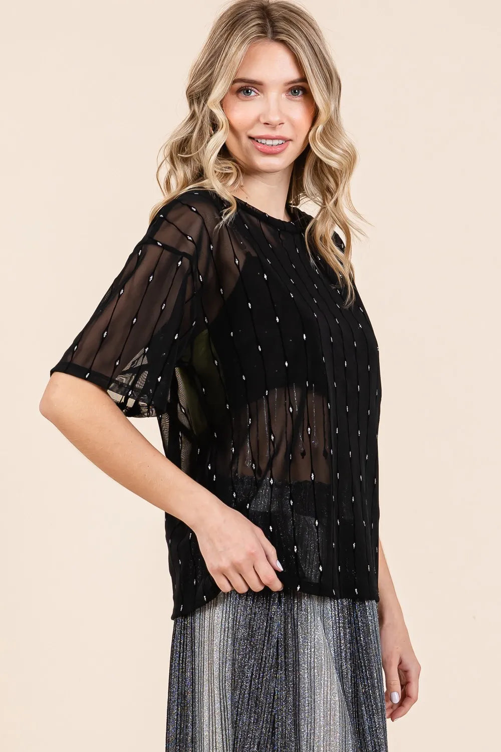 Black GeeGee round neck drop shoulder mesh top with glitter accents, stylish and comfortable for casual or dressy outfits.
