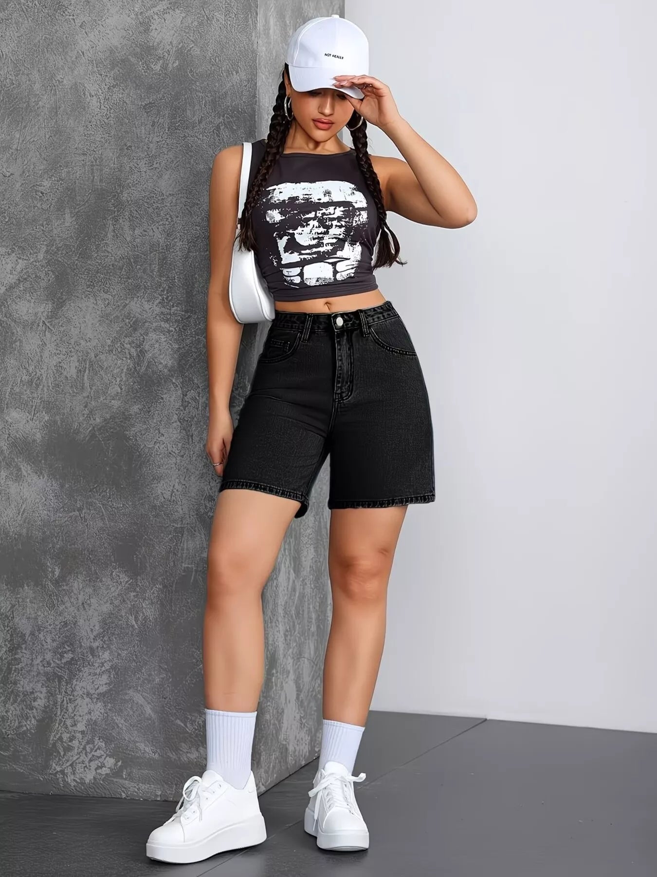 Black high-waisted denim shorts by Trendsi, featuring a classic fit and stylish design, perfect for casual summer outfits.